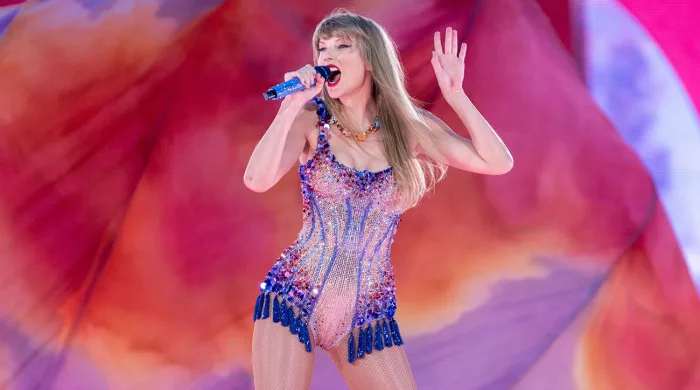 Image of Taylor Swift during the Eras tour in Minneapolis night 2 as a header for the Swiftie Season section of the Slowestuff blog