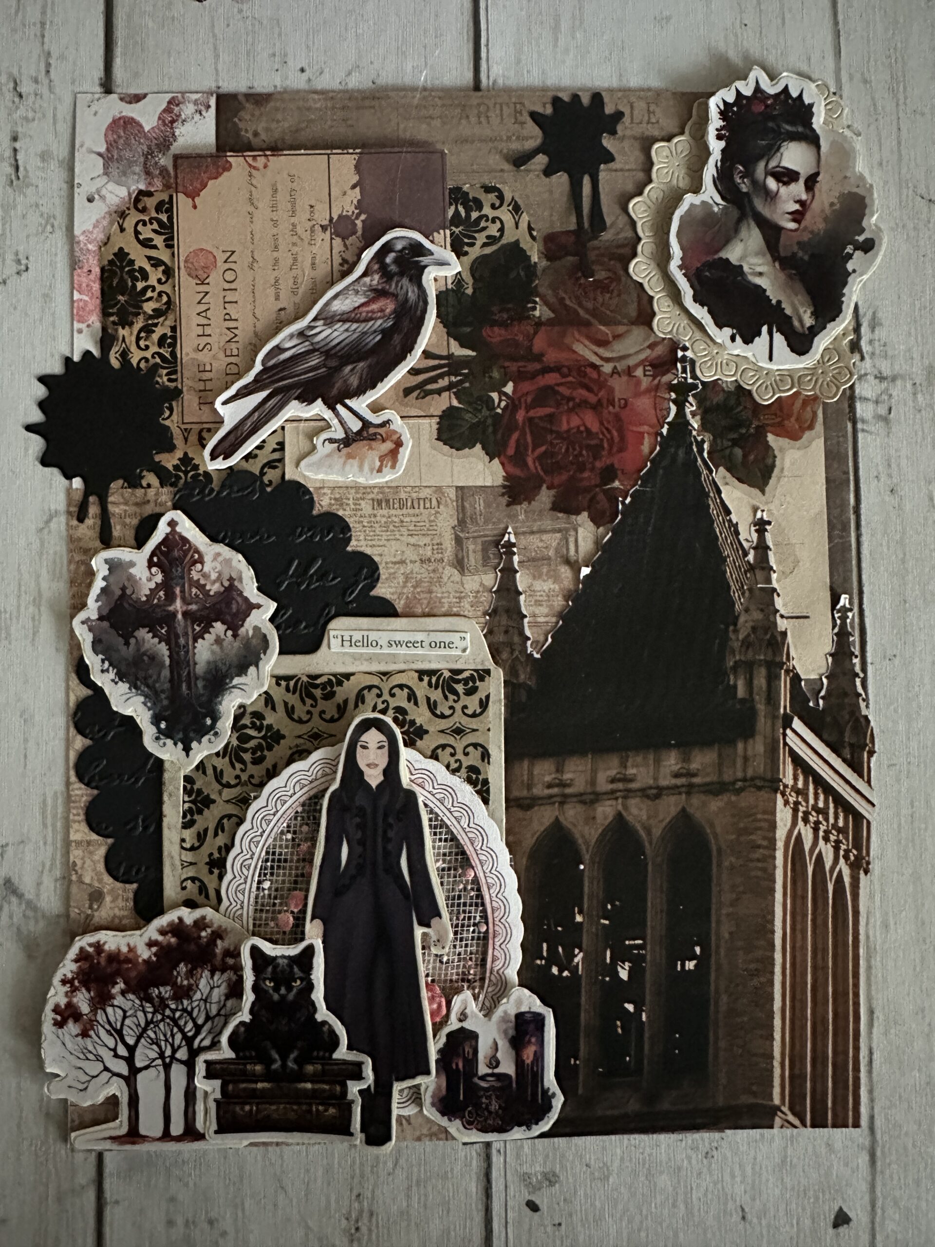 Junk journal page with a gothic building tower surrounded by stickers of a gothic looking woman, black cats, a cross, a raven, candles, a spooky forrest, and another picture of a woman who has turned into a vampire