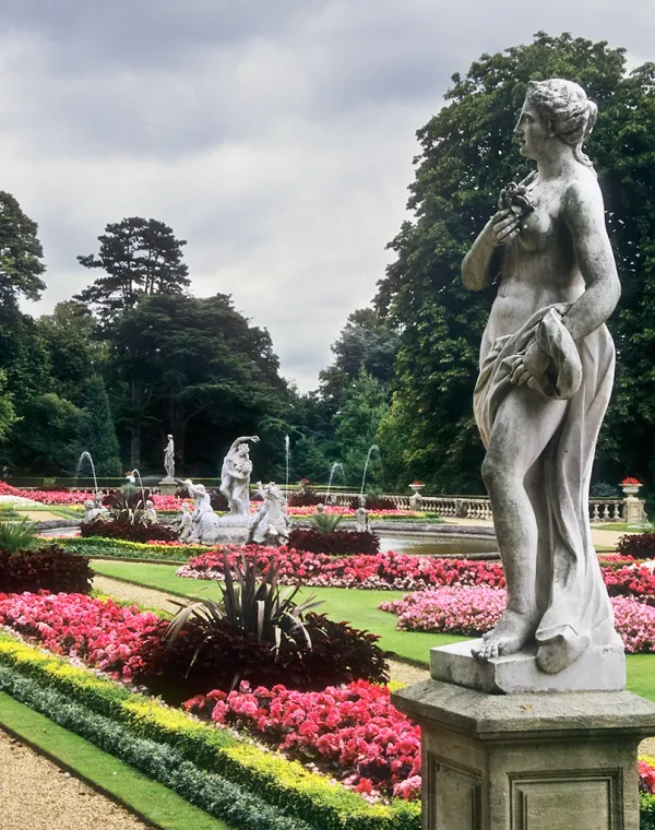 flower garden with statue