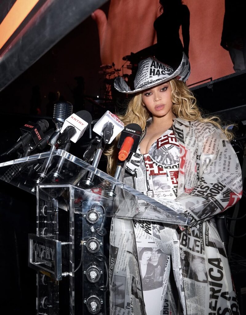 Beyoncé newspaper print pants and top—Cowboy Carter tour Halloween costume inspiration for music lovers and concert outfits | Slowestuff.com