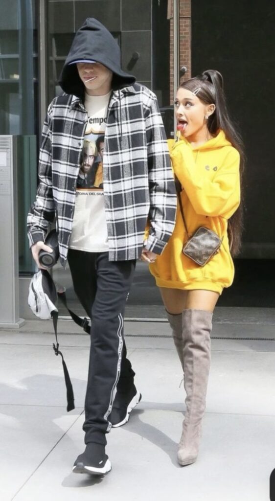 Ariana Grande and Pete Davidson couples Halloween costume idea with yellow hoodie and thigh high boots | www.slowestuff.com