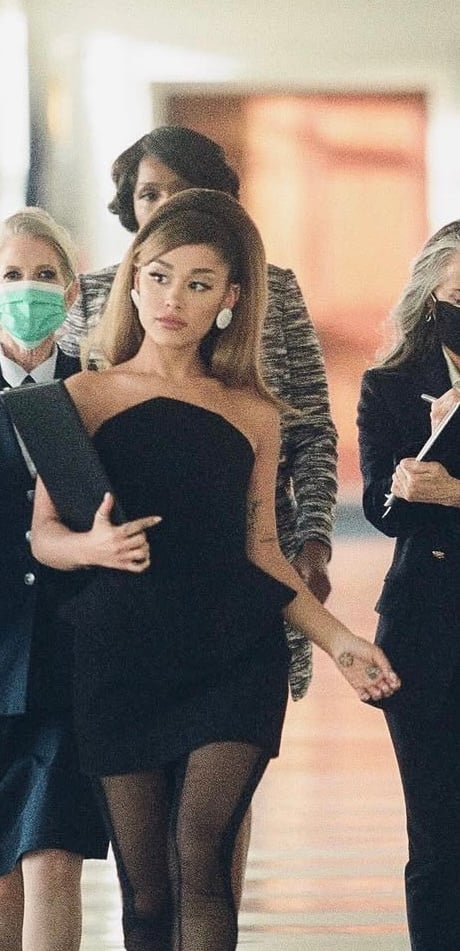 Ariana Grande Legally Blonde inspired Halloween costume with peplum top, black mini skirt, and dramatic headpiece | www.slowestuff.com