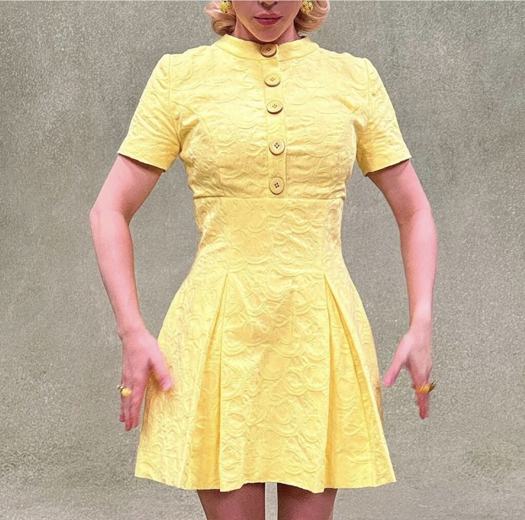 Billie Eilish wearing a yellow dress inspired by her Barbie movie appearance, a bright and unique costume idea. Photo credit: @billieeilish on Instagram via Slowestuff.com