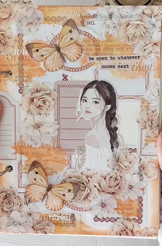 Junk journal pages with orange tones, collage work, and whimsical doodles. Credit: a_scrapbooking on Instagram.