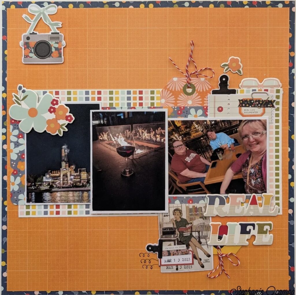 Orange junk journal idea with textured paper, bold stickers, and stamped details. Credit: scrappystephocampo on Instagram.