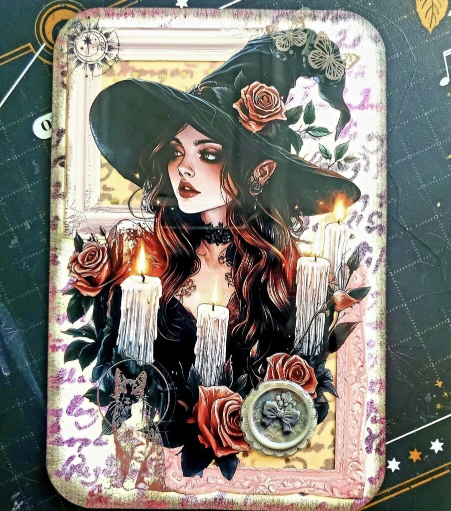 Gothic witch junk journal page featuring a dramatic witch in a black hat with roses, rich gothic textures, deep burgundy and black, and romantic witchy vibes. Credit: @my.dearest.journal