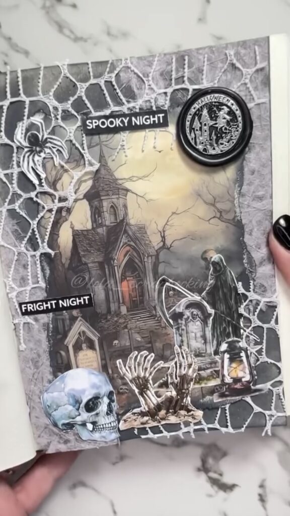 Graveyard scrapbook layout with haunted church and skull. Credit: lola_scrapbooking