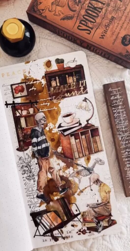 Cozy junk journal with skeletons, books, and coffee. Credit: journalzjourney & cheeryletters