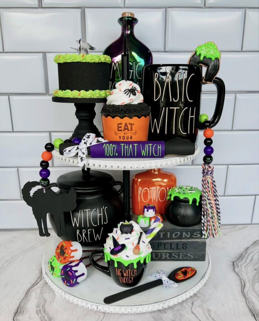 Witch themed tiered tray styled with basic witch mug, and witch’s brew cauldron. Credit: bowsandsilos, www.slowestuff.com