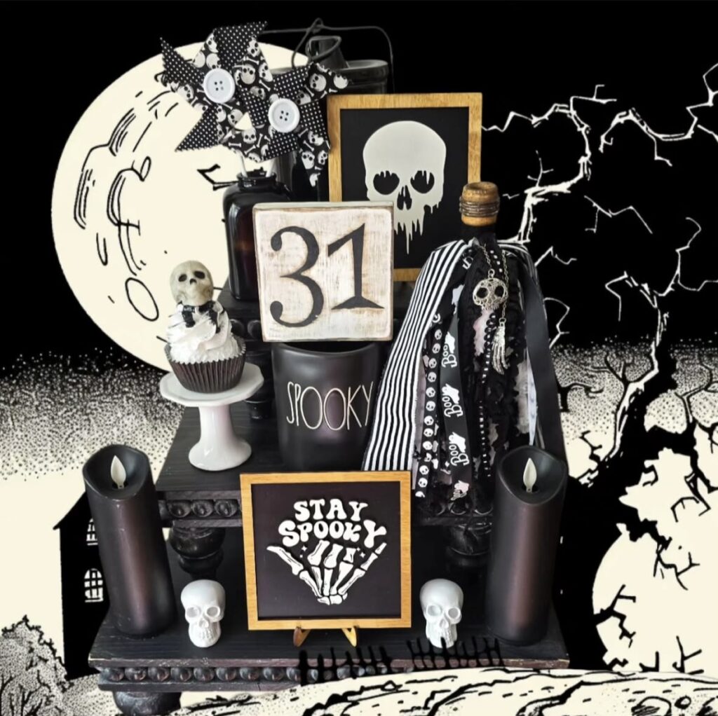 Haunting Halloween tiered tray with skeletons, stacked skulls, bone accents, and October 31st decor for spooky season. See more at www.slowestuff.com.