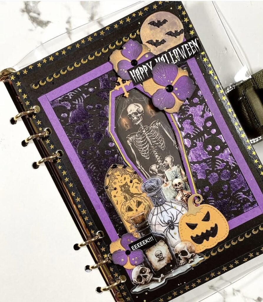 Skeleton planner layout with coffin, pumpkins, and potions. Credit: liu_journal