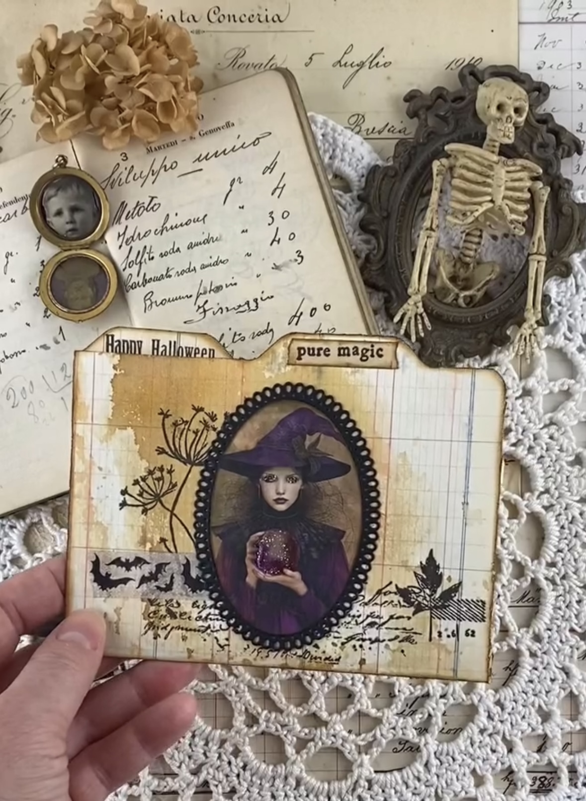 Vintage witch Halloween journal card in warm sepia tones, with a witch in a purple dress and subtle magical details. Credit: @_paper_garden