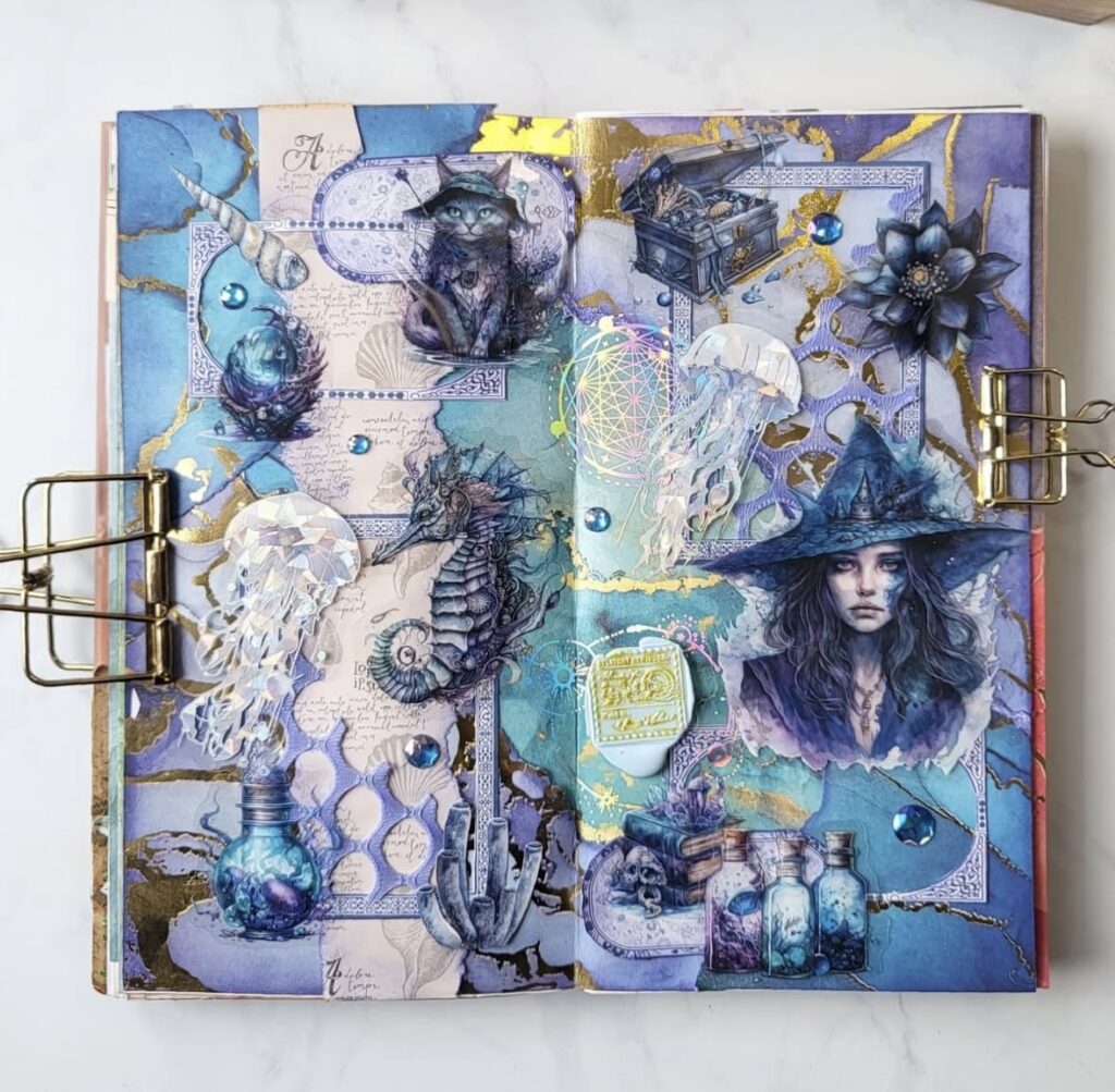 Water witch journal layout in blue tones, featuring sea creatures, potion bottles, a crystal ball, and ocean fantasy details. Credit: @lazylattejournal