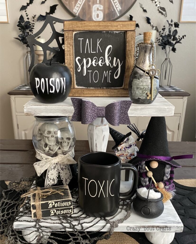 Witchcore Halloween tray with “Talk Spooky To Me” sign, gnome, fortune teller globe, skulls, and skeleton key. Credit: crazy_bout_crafts, www.slowestuff.com