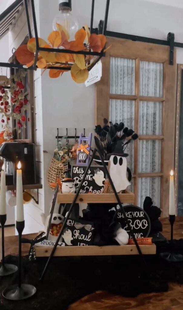 A-line ghost tiered tray with layered ghost decor and minimalist black-and-white color palette—modern and so cute. Credit: carolina.cozy.