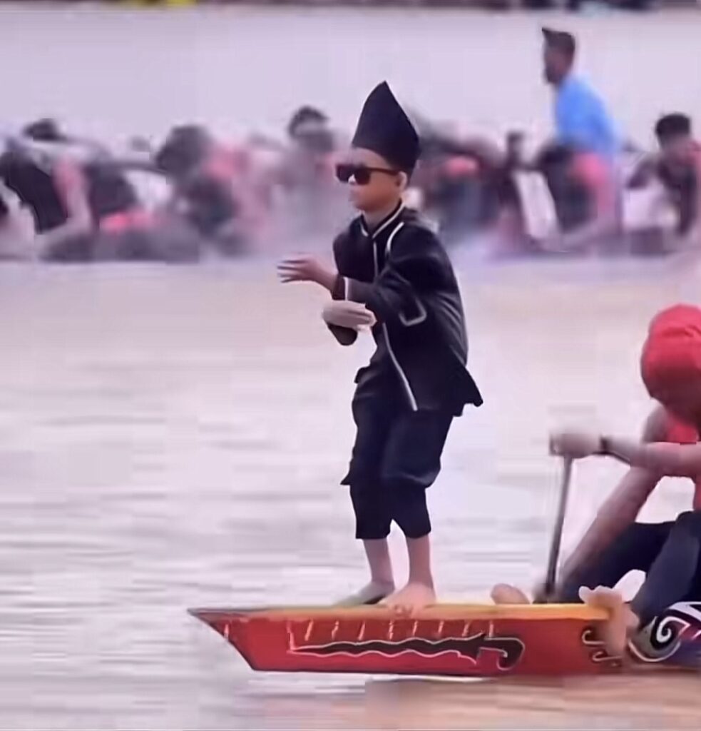Screenshot of the viral TikTok “Aura Farming” kids on a boat, from @greenscreens4memes. Group costume inspiration for trending TikTok Halloween ideas 2025.