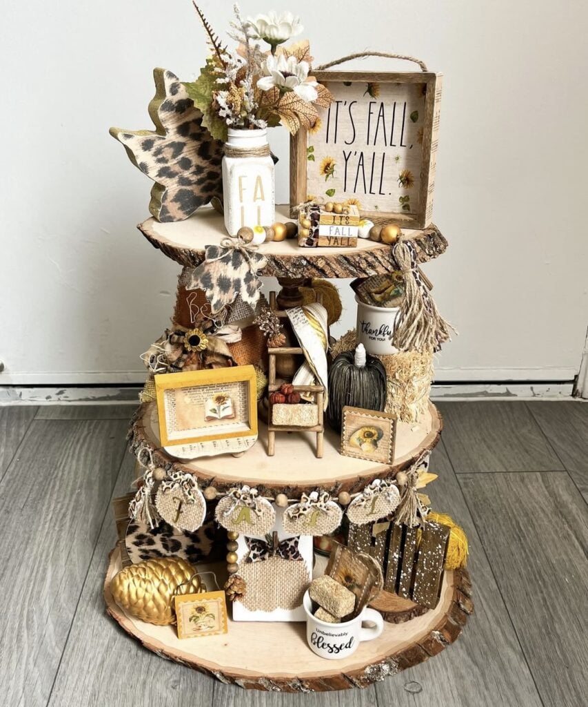 Three tier wooden tray with Its Fall yall sign and animal print accessories
