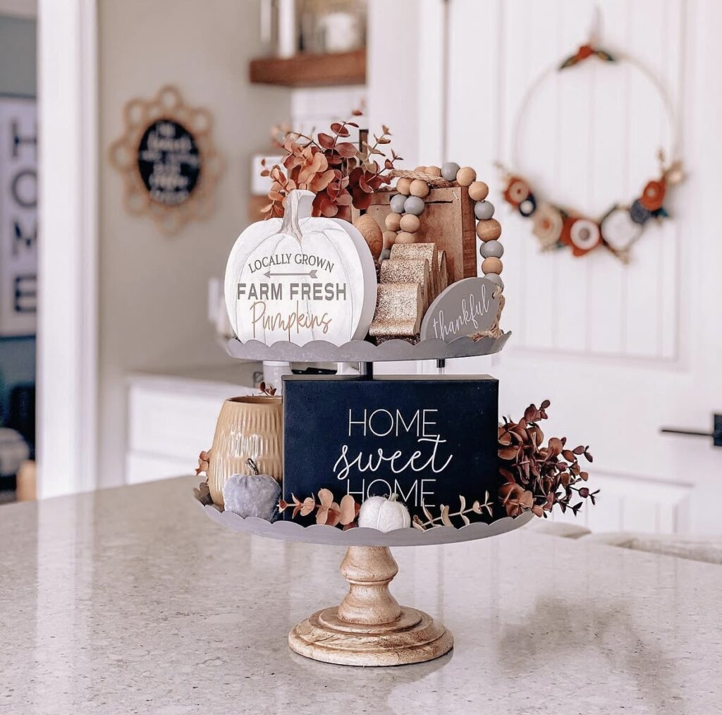 Scalloped tier tray with signs decorating it