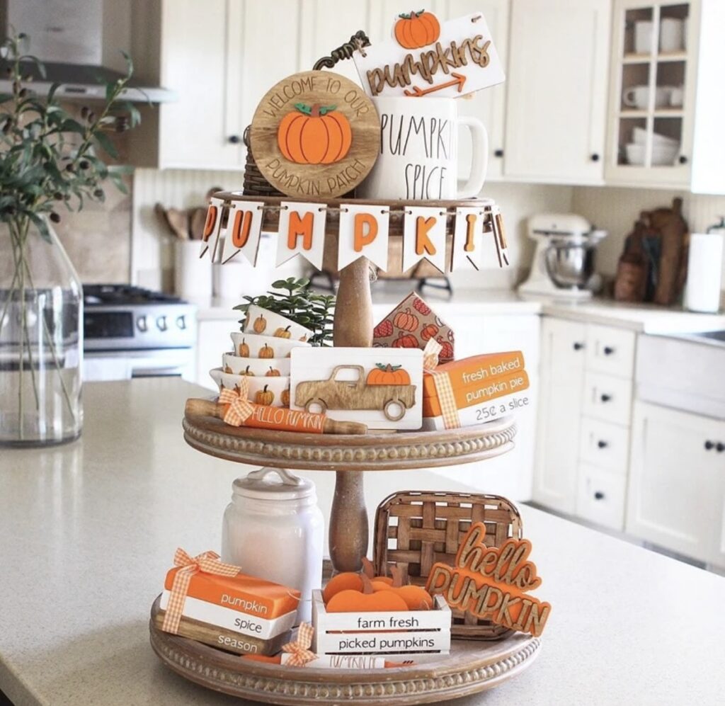 Round wooden tiered tray for fall with pumpkin theme
