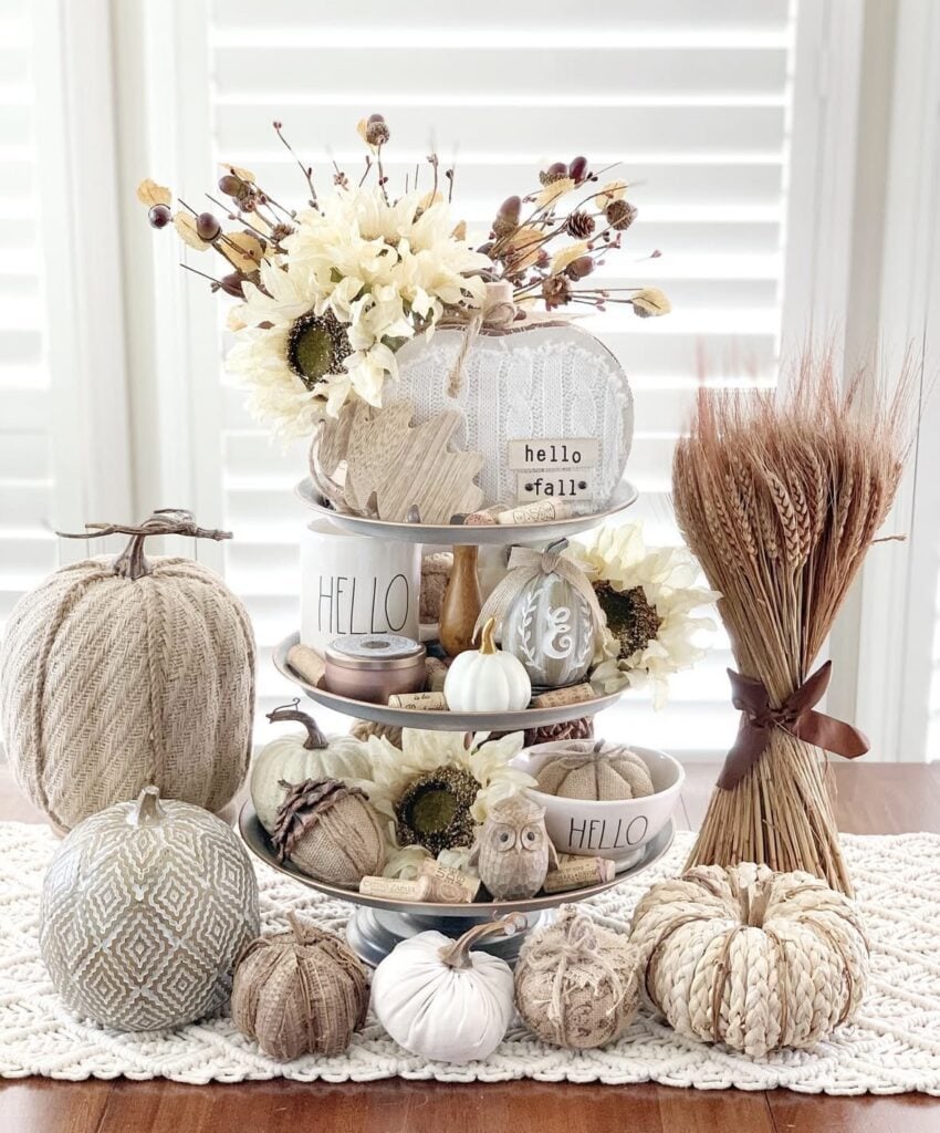 Neutral themed fall tiered tray with owl, pumpkins and flowers
