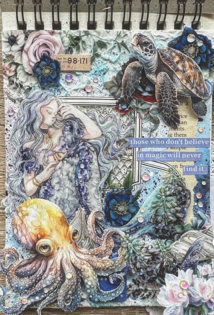 Ocean junk journal page with an octopus and sea turtle imagery, layered florals, and deep blue underwater textures