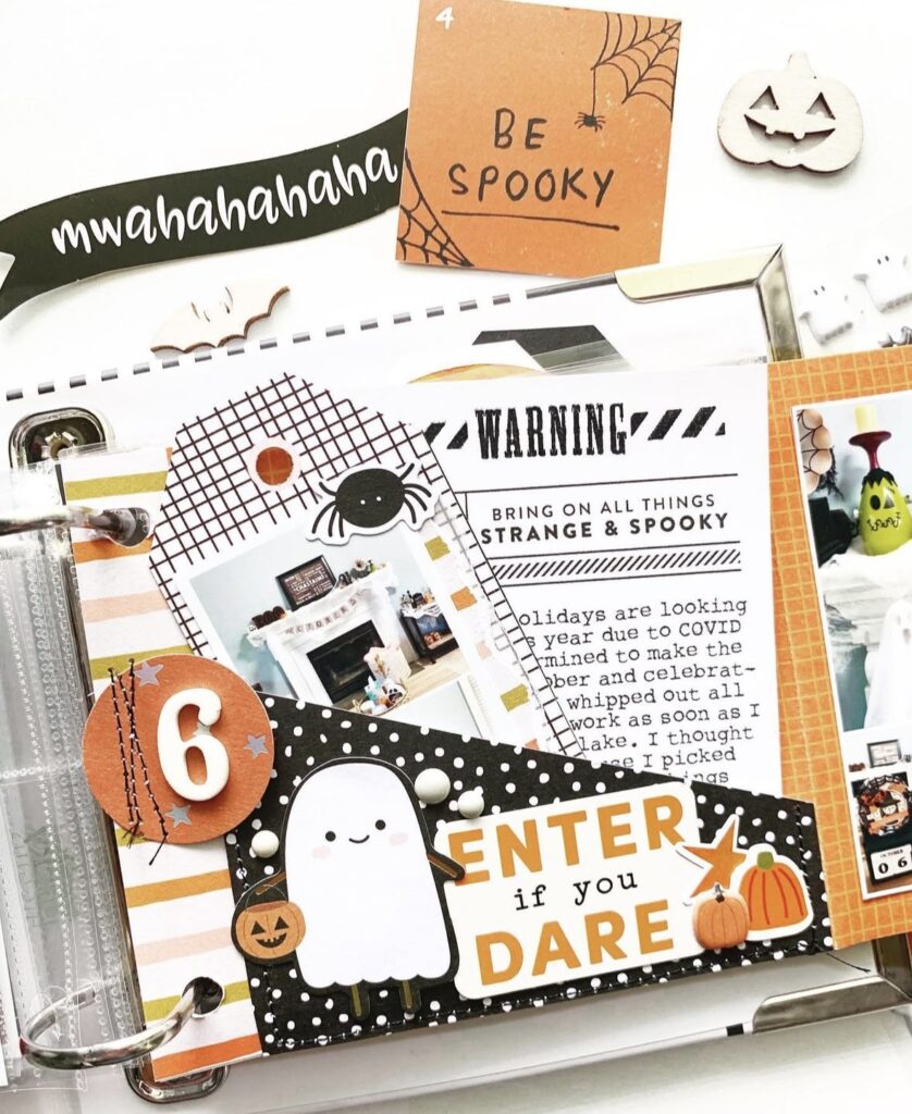 October Daily pocket page with “Enter If You Dare” card, vellum ghosts, and photo pockets.