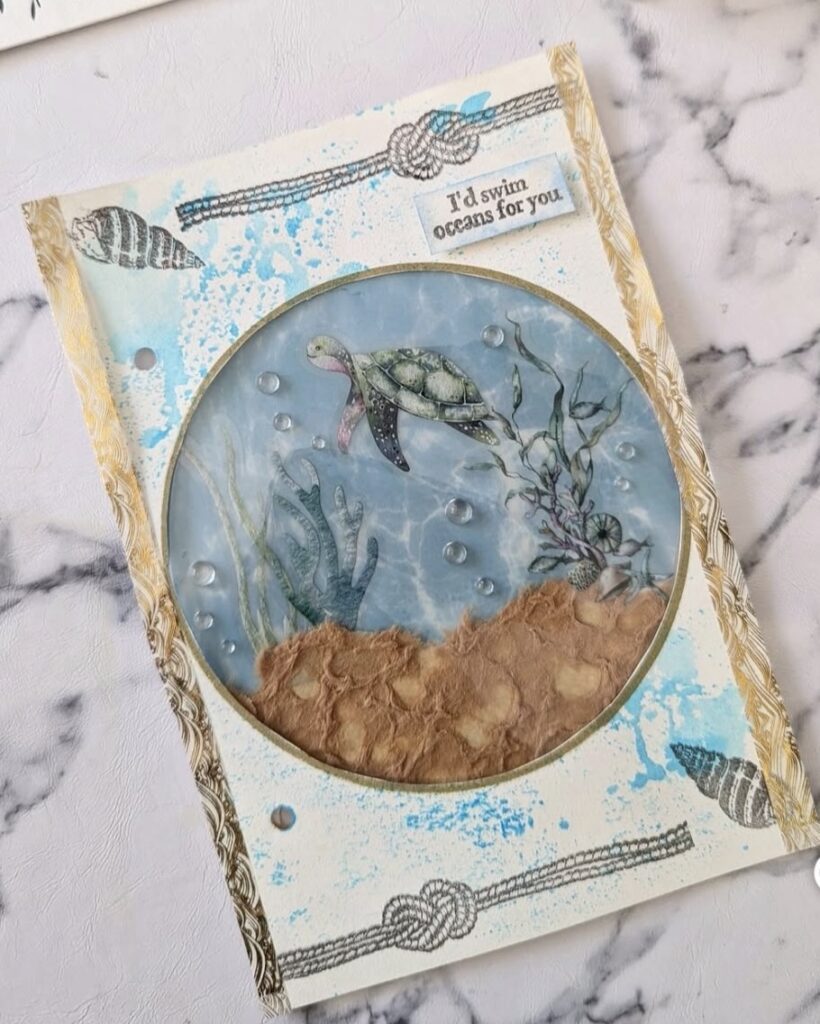 Ocean journal card with an underwater porthole design featuring a sea turtle, bubbles, and layered blue ocean textures and says id swim oceans for you