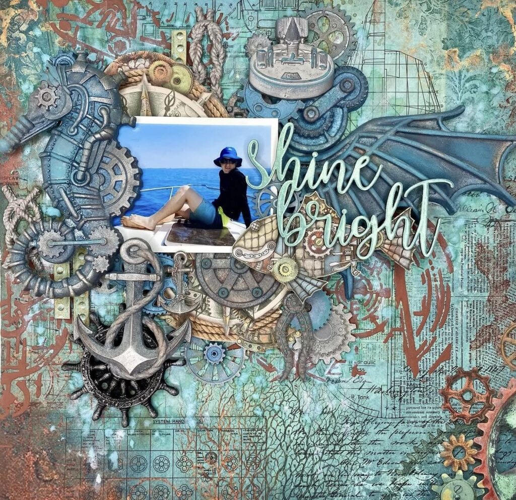 Steampunk ocean scrapbook layout with gears, metal accents, and sea-themed ephemera with a ‘shine bright’ style title