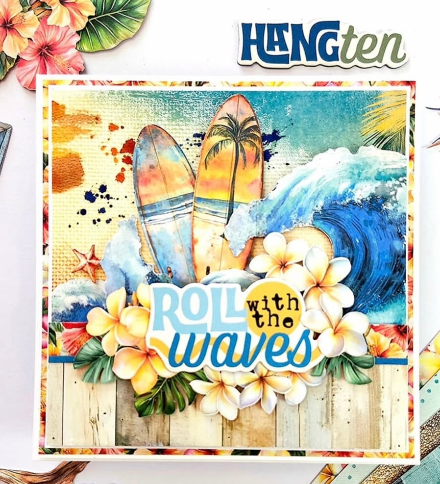 Pinterest pin graphic showing a tropical beach scrapbook card with surfboards, a crashing ocean wave, and plumeria flowers, with the text “HANG ten” and “ROLL with the waves,” featured by slowestuff.com.