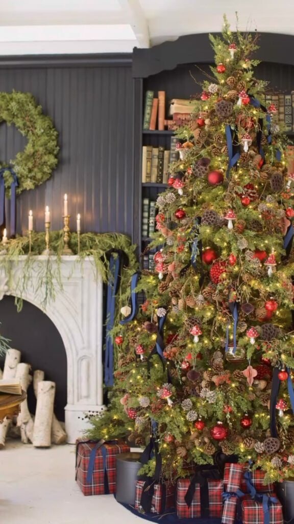 classic-library-woodland-tree—mushrooms-and-pinecones—navy-ribbon—red-baubles—seed-pods
