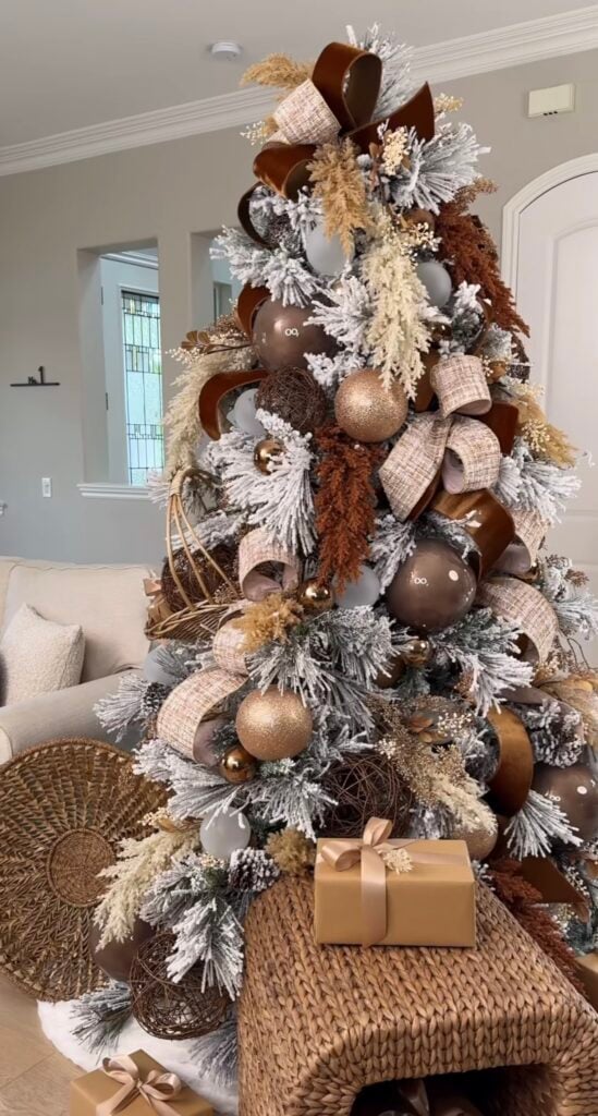 cocoa-and-caramel-flocked-tree—velvet-ribbon—pampas-picks—rattan-spheres—warm-metallics
