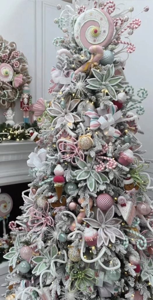 Pastel candyland glam Christmas tree with lollipops, gingerbread accents, and sweet shop décor.