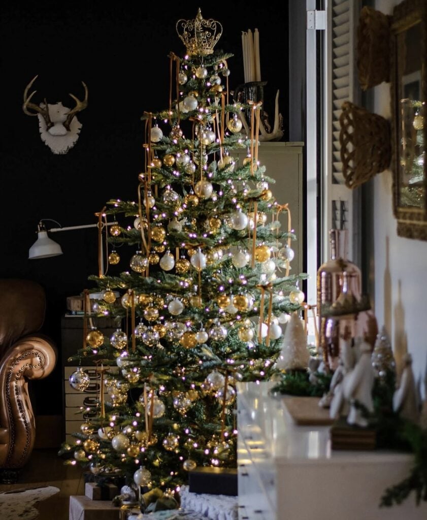 gold and ivory Christmas tree with crown topper, ribbon garland, vintage glam style