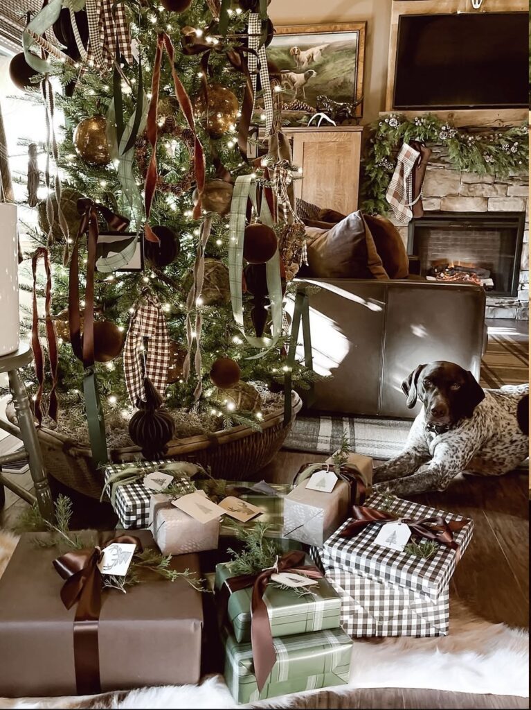 rustic lodge Christmas tree with velvet ribbons, gingham ornaments, and warm brown and green gift wrap