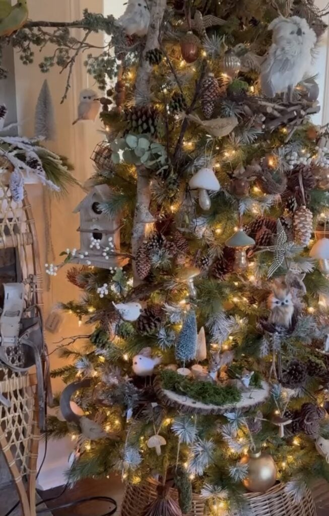 Woodland Christmas tree with owls, pinecones, and rustic toadstool ornaments
