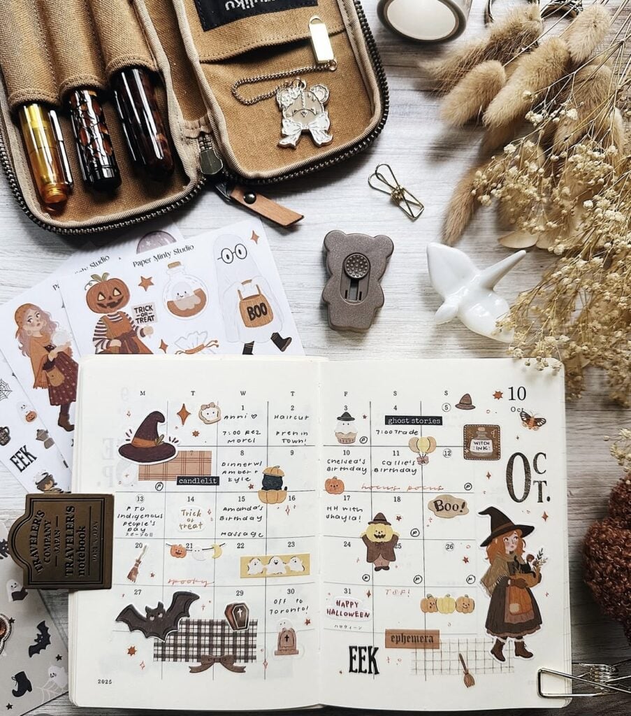 Traveler’s notebook October monthly planner with cute witch illustration