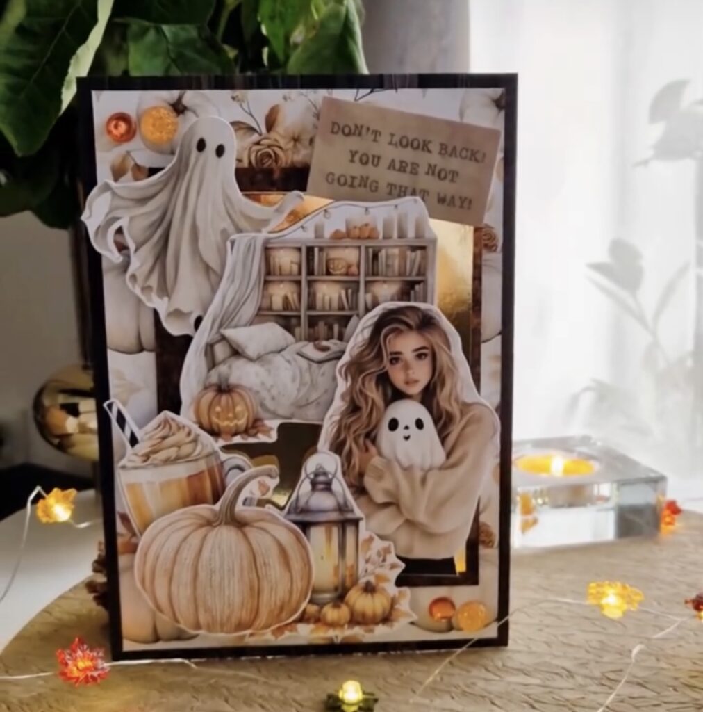 girl hugging ghost scrapbook page with muted neutrals