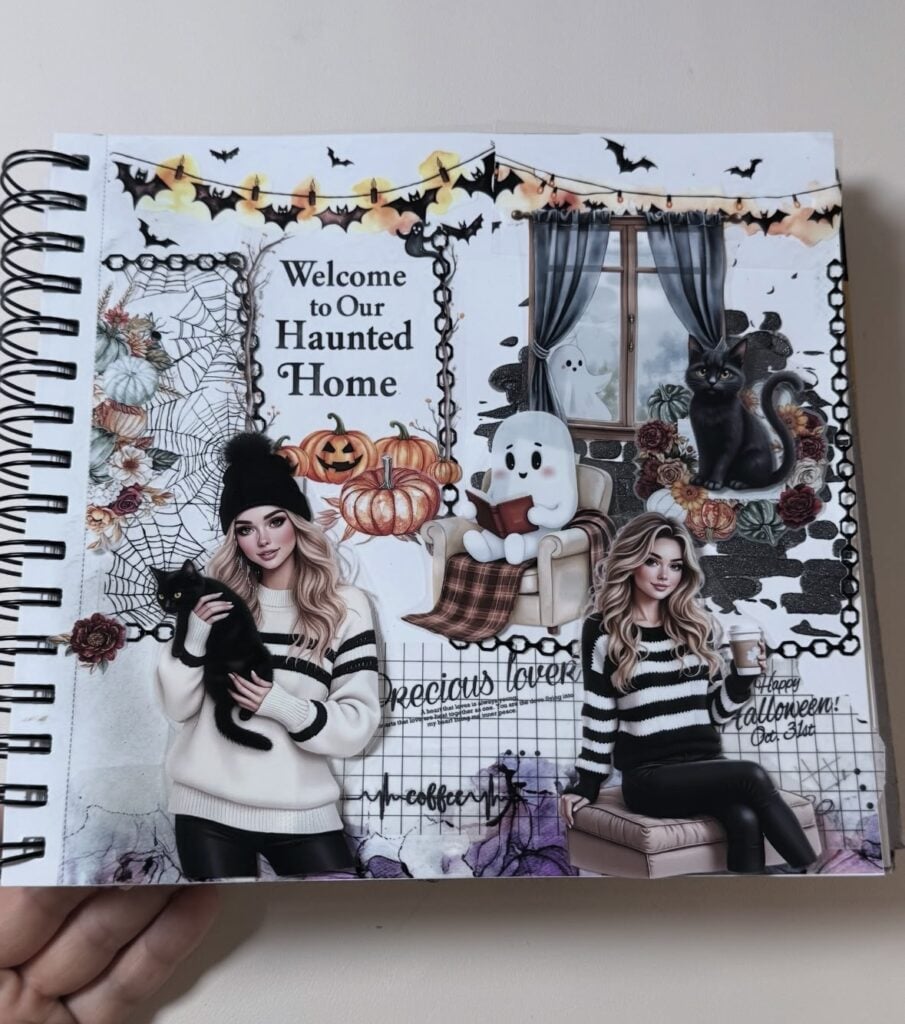 Cozy, cute Halloween scrapbook page with ‘Welcome Haunted Home’ sign, soft colors, and layered chipboard.