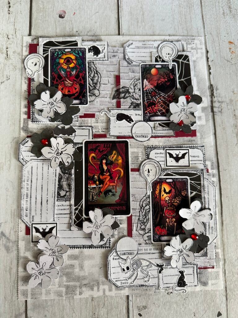 Monochrome Halloween junk journal page with white and gray sticker collage, icons, and layered labels for scrapbook inspiration