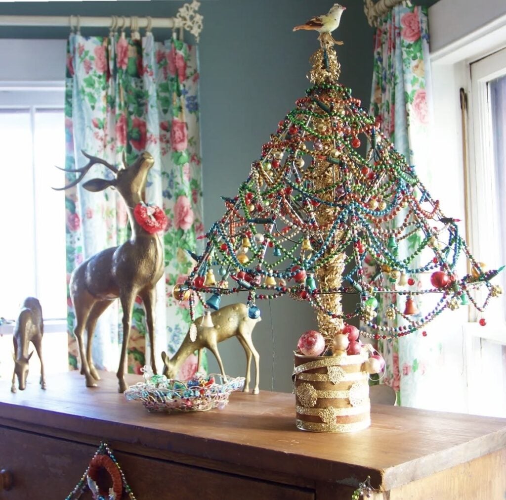 Creative tabletop Christmas tree alternative with colorful holiday decorations and playful seasonal style