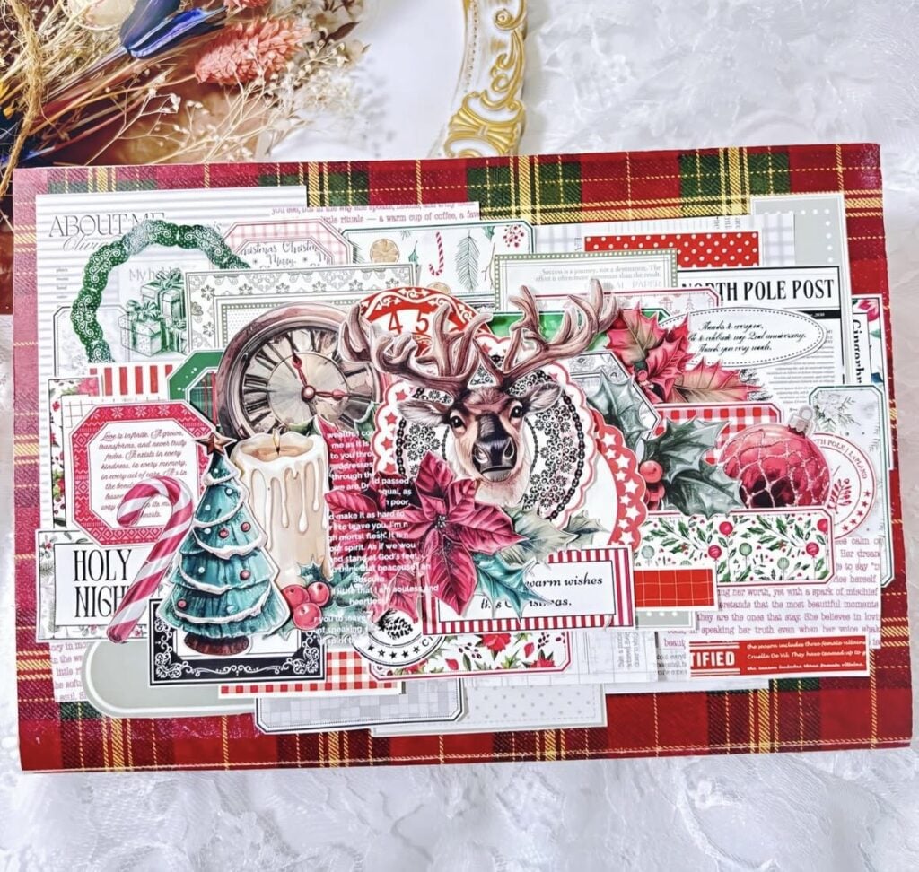 Christmas collage scrapbook page with layered holiday paper and mixed media elements