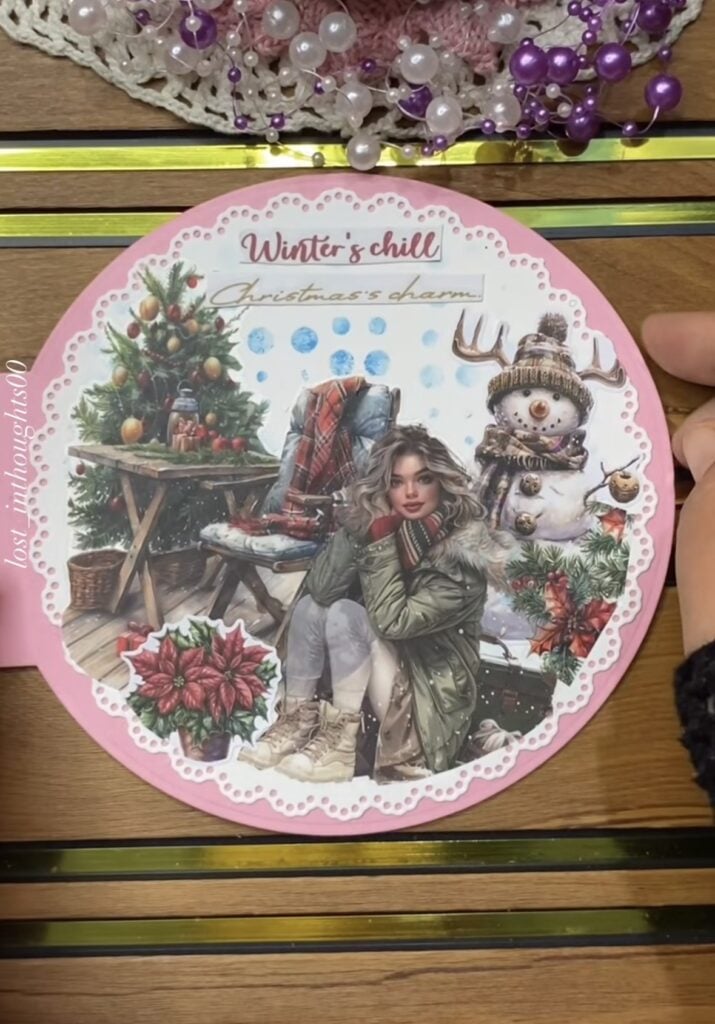 Christmas scrapbooking idea with layered festive paper and mixed media embellishments