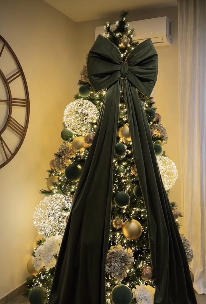 Non-traditional Christmas tree with dramatic decorations and bold holiday styling