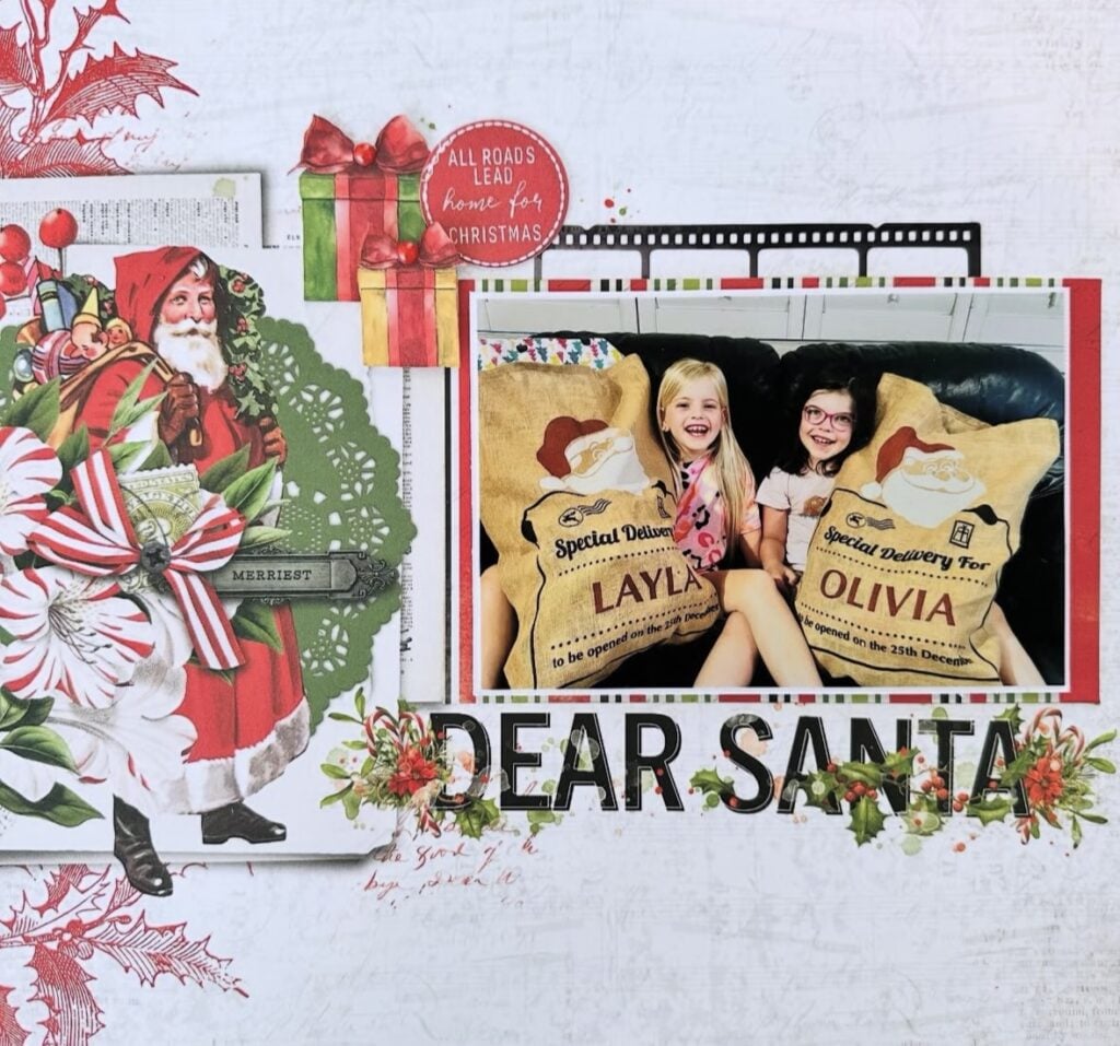Bright Santa scrapbook page with poinsettias, Christmas lights, colorful paper and layered decorations