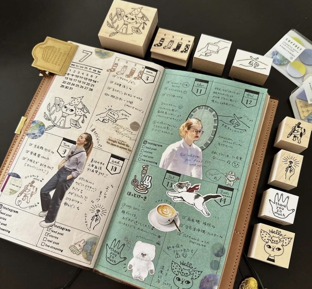 Travel journal spread with sticker-style illustrations, Japanese handwriting, and a teal grid page featuring a cat, coffee cup, and small character stamps.