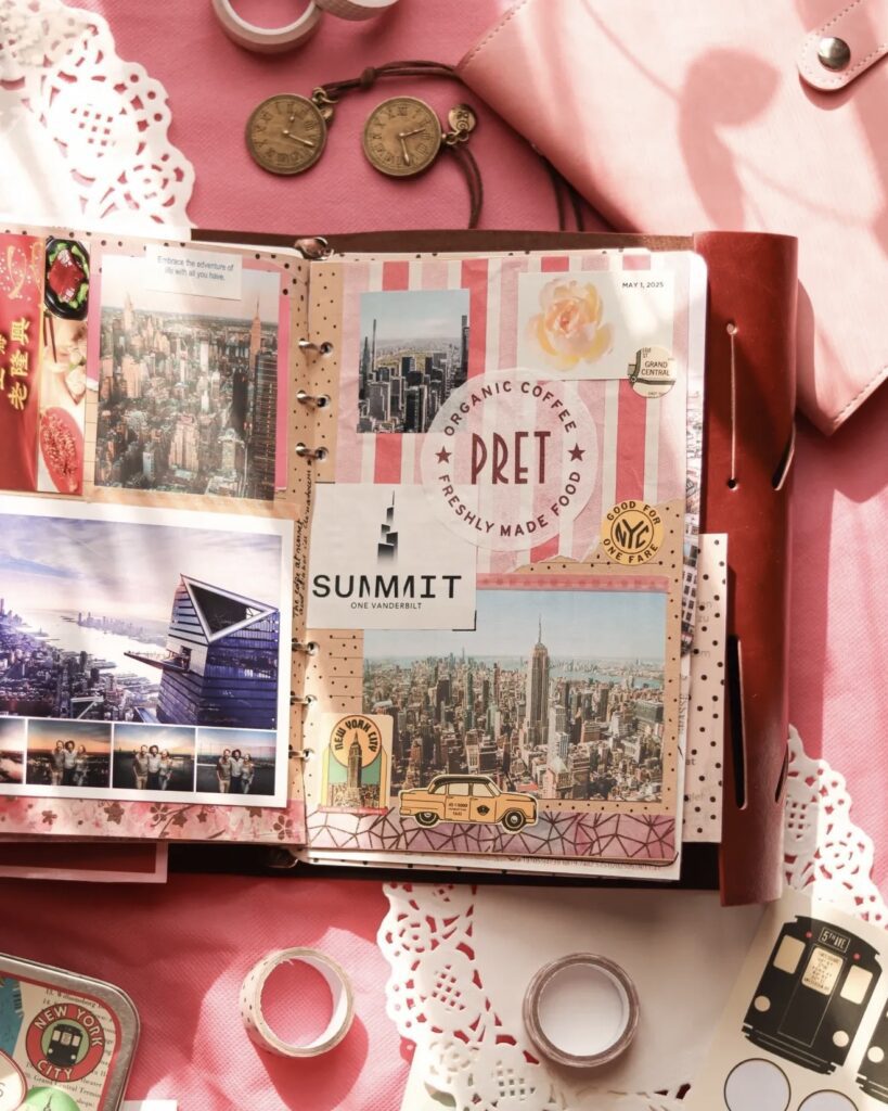 Pink-themed travel scrapbook spread with New York City photos, “PRET” coffee ephemera, taxi sticker, and washi tape accents in a ring-bound album.