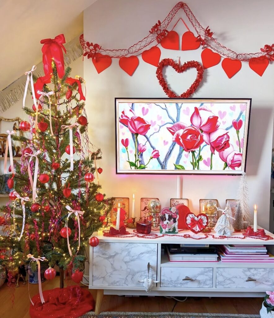 Simple Valentines Day tree decorated with pink hearts, ribbon, and cozy textures in a bright room, credit jen_sweethome.