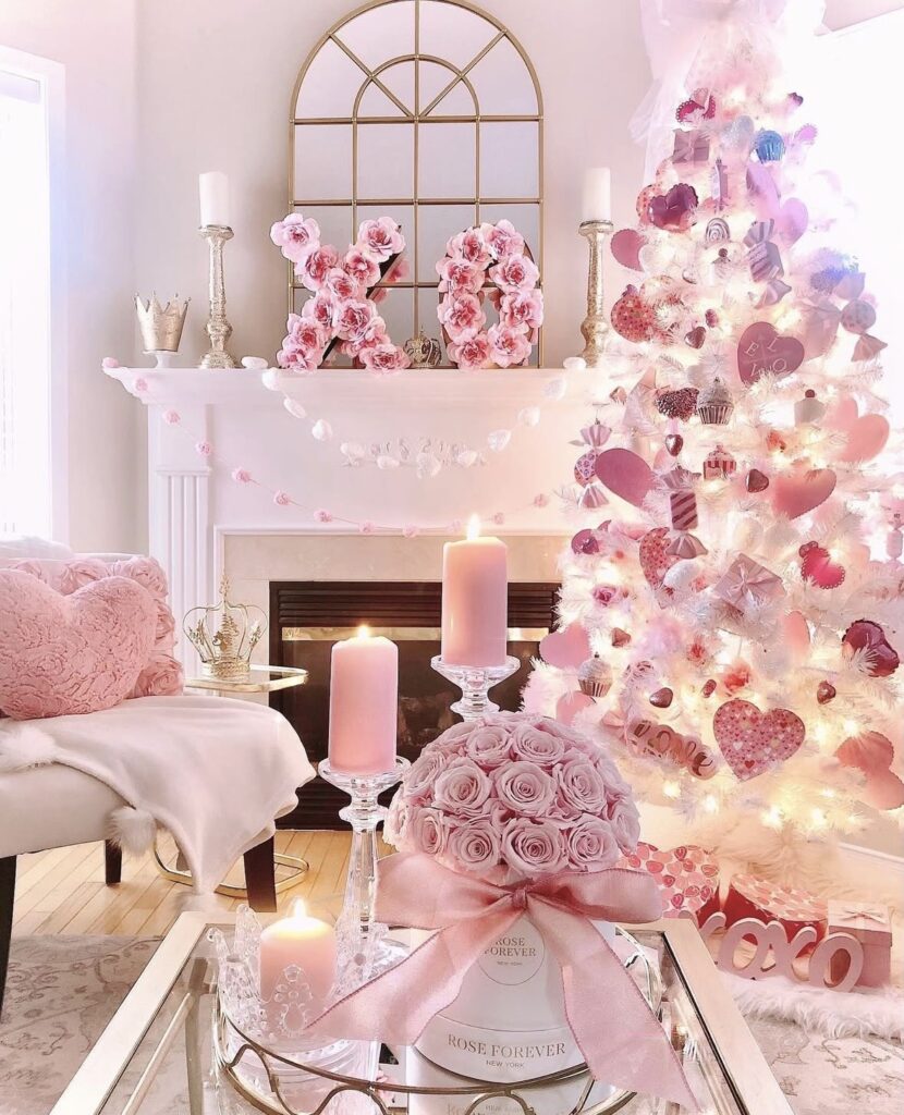 Bold Valentines Day tree packed with red, pink, and white heart decor and statement ribbon, credit decoratordiva1.