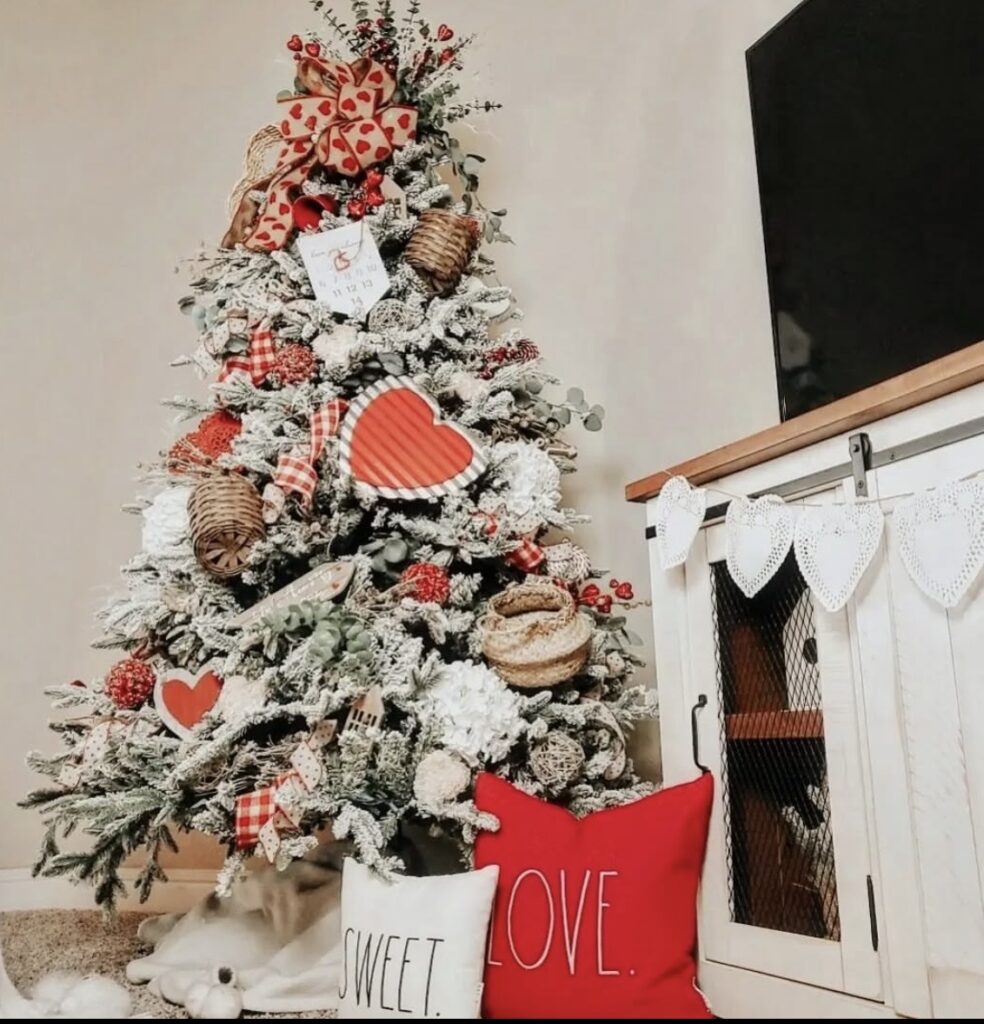 Valentines Day tree decorated with layered hearts, mesh ribbon, and bold pink accents, credit brilopez__.