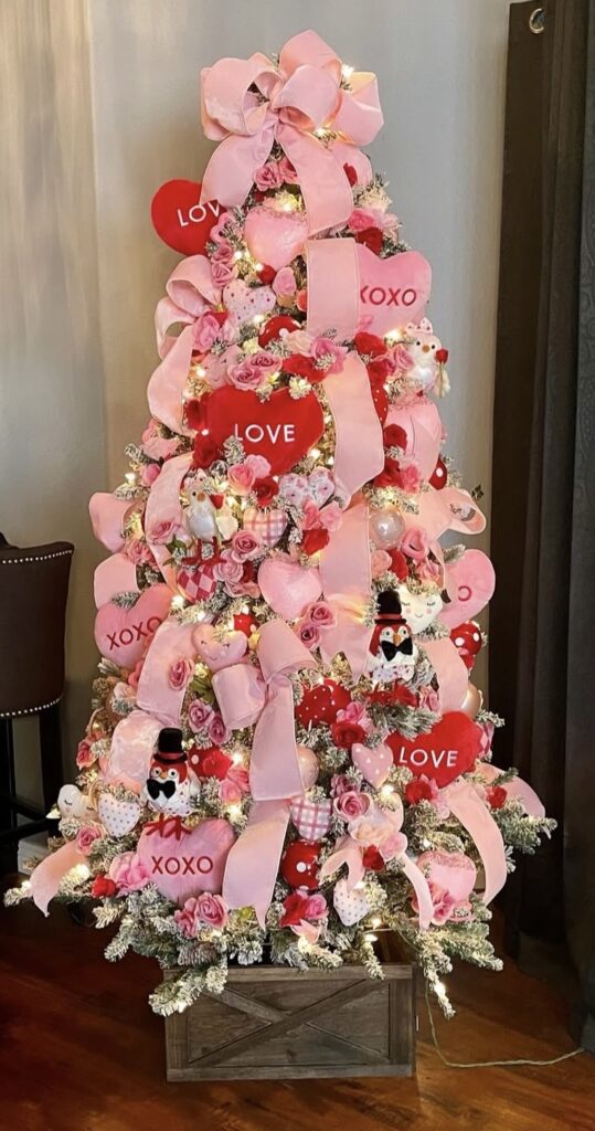 Whimsical Valentines Day tree with pastel hearts, ribbon, and playful decor pieces, credit mysweetwhimsy.